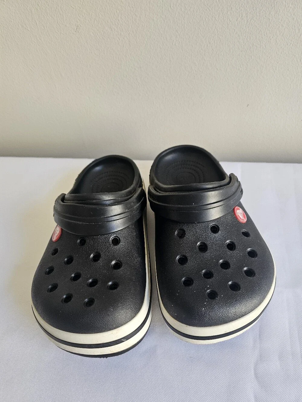 CROCS Kids Black Clogs with White Stripe